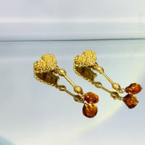 textured gold heart linear drop earrings with orange metal bead