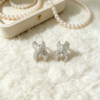 full paved crystal cross x shape statement stud earrings