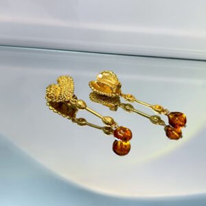textured gold heart linear drop earrings with orange metal bead