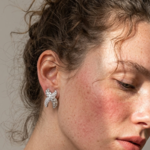 full paved crystal cross x shape statement stud earrings